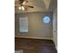 Bright bedroom featuring wood-look floors and an octagon window at 251 Ralph David Abernathy Sw Blvd, Atlanta, GA 30312