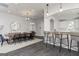 Community dining area with a farmhouse table and modern chairs at 1004 Claas Way, Locust Grove, GA 30248