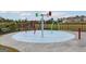 Community splash pad with colorful spray features at 1012 Claas Way, Locust Grove, GA 30248