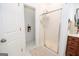 Bathroom with shower, linen closet, and access to bedroom at 313 Dingler Rd, Moreland, GA 30259