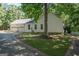 White house exterior with two-car garage and landscaping at 313 Dingler Rd, Moreland, GA 30259