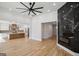 Open concept living room with kitchen view and hardwood floors at 618 Bellemeade Dr, Marietta, GA 30008