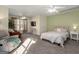 Spacious bedroom with sitting area and large windows at 60 Sweetwater, Social Circle, GA 30025