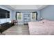 Main bedroom with large bed and trey ceiling at 2744 Amber Springs Way, Buford, GA 30519