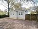 Home exterior view with backyard and wooden fence at 3444 Orchard Cir, Decatur, GA 30032