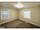 Spacious bedroom with neutral walls and carpet flooring at 3444 Orchard Cir, Decatur, GA 30032
