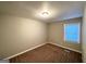 Simple bedroom with neutral walls and carpet flooring at 3444 Orchard Cir, Decatur, GA 30032