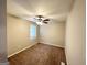 Cozy carpeted bedroom with ceiling fan and window at 3444 Orchard Cir, Decatur, GA 30032