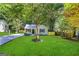 Newly renovated house with a well-manicured lawn and driveway at 3444 Orchard Cir, Decatur, GA 30032