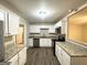Modern kitchen with granite countertops and white cabinets at 3444 Orchard Cir, Decatur, GA 30032