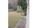 Landscaped backyard with grassy area and wooden fence at 345 Gaelic Way # 2, Tyrone, GA 30290