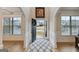 Elegant entryway with hardwood floors and open concept at 5760 Winding Lakes Dr, Cumming, GA 30028