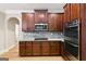 Modern kitchen featuring stainless steel appliances and granite countertops at 5760 Winding Lakes Dr, Cumming, GA 30028