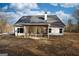 House exterior showcasing a screened porch at 1833 Tommy Lee Cook Rd, Palmetto, GA 30268