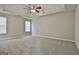 Spacious bedroom with ceiling fan and neutral walls at 12241 Crestwood Ct, Fayetteville, GA 30215