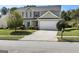 Two-story house with a driveway and mailbox at 80 Rosemoore Dr, Covington, GA 30014