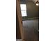 Carpeted bedroom with a ceiling fan and window at 160 Orchard Dr, Covington, GA 30014