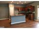 Modern kitchen featuring stainless steel appliances and an island at 160 Orchard Dr, Covington, GA 30014