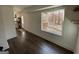 Hallway with wood floors and a large window with wooded views at 270 Carrolls Way, Fayetteville, GA 30215