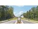 A picturesque street view leading to a modern white home, surrounded by lush greenery and a clear blue sky at 3920 Clifton Hill Ct, Cumming, GA 30040
