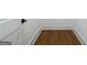 Hardwood flooring with white trim and baseboards add a touch of class to any room at 3920 Clifton Hill Ct, Cumming, GA 30040