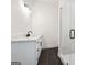Clean bathroom with a white vanity, quartz countertop, and glass-enclosed shower at 3920 Clifton Hill Ct, Cumming, GA 30040