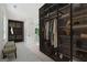 Walk-in closet with custom shelving and drawers for organized storage at 3920 Clifton Hill Ct, Cumming, GA 30040