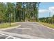 Parking lot for new community with an outdoor comfort station and gazebo at 3920 Clifton Hill Ct, Cumming, GA 30040