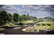 Entrance to Bethelview Manor with a sign, landscaping, and a view of the new community at 3920 Clifton Hill Ct, Cumming, GA 30040