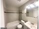 Full bathroom with tiled shower/tub combination, modern vanity, and fixtures at 2830 Battle Forrest Dr, Decatur, GA 30034