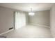 Dining area with tile flooring and sliding glass doors that lead to the backyard at 2830 Battle Forrest Dr, Decatur, GA 30034