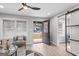 Bright living room with open floor plan and sliding barn door at 1955 Maywood Nw Pl, Atlanta, GA 30318