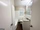 Clean bathroom with white tile, granite vanity, and a tub/shower combo at 1581 Mcclelland Ave, Atlanta, GA 30344