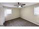 Inviting bedroom with carpeting, a ceiling fan, and ample natural light at 464 Stonewood Dr, Stone Mountain, GA 30087