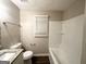 Bathroom with a granite vanity, a combination shower and bathtub, and vinyl flooring at 3429 Adkins Nw Rd, Atlanta, GA 30331