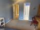 Blue bedroom with open door to a bathroom at 3003 Canter Way, Duluth, GA 30097