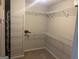 Walk-in closet with ample shelving and hanging space at 3003 Canter Way, Duluth, GA 30097