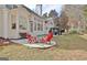 Cozy patio with fire pit and seating area near the house at 121 Lexington Pass, Peachtree City, GA 30269