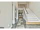 Grand foyer with a staircase and tiled floor at 165 Standing Oak Pl, Fayetteville, GA 30214