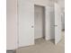 Spacious closet with double doors and ample storage at 1019 Cades Walk, Lawrenceville, GA 30045