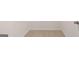Neutral carpet in walk-in closet with bright white walls at 1019 Cades Walk, Lawrenceville, GA 30045