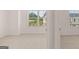 Bright bedroom features large windows offering plenty of natural light at 1019 Cades Walk, Lawrenceville, GA 30045