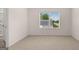 Bright bedroom with neutral carpet and a window offering neighborhood views at 1019 Cades Walk, Lawrenceville, GA 30045