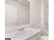 Bathroom vanity features white marbled countertops at 1019 Cades Walk, Lawrenceville, GA 30045