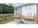 Townhome rear view with private decks and garages, modern design and new construction at 1019 Cades Walk, Lawrenceville, GA 30045