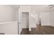 Upstairs hall features open closet, stairs, and access to other rooms at 1019 Cades Walk, Lawrenceville, GA 30045