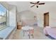 bedroom with window seat, a small white table, and plenty of natural light at 205 Creekrise Pl, Palmetto, GA 30268