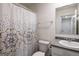 Clean and bright bathroom with a shower/tub combo and modern vanity at 1304 Speckle Park Way, Stockbridge, GA 30281