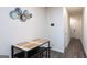 Dining area with a modern table, and decorative wall art at 1304 Speckle Park Way, Stockbridge, GA 30281