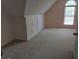 Spacious bedroom with carpeted floor and large window at 2322 Runnymede Ct, Jonesboro, GA 30236